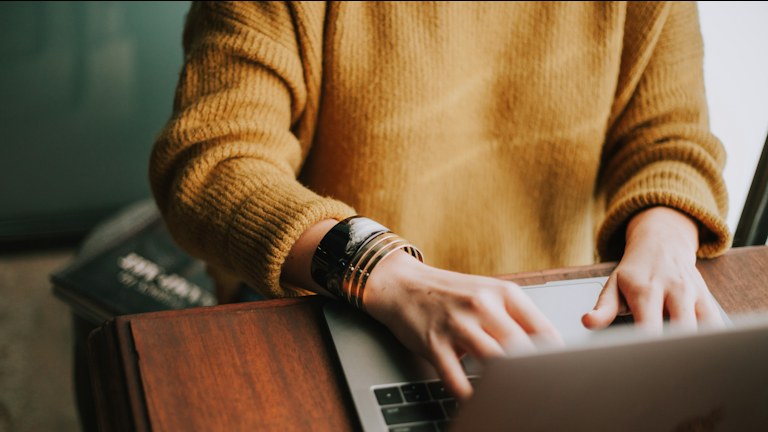 person using laptop computer