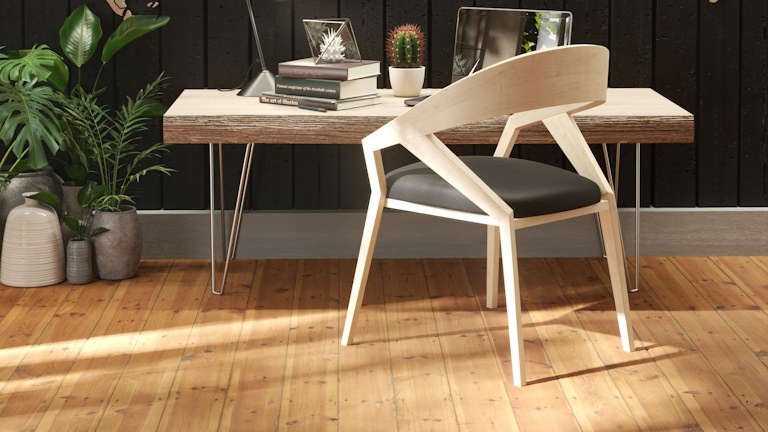 Wooden desk and chair in a bright workspace