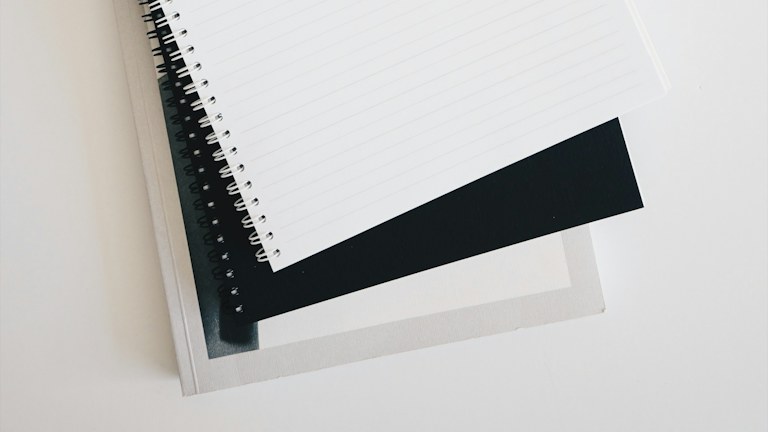 Open blank notebook on a desk