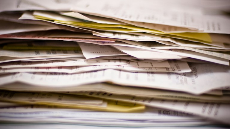 A close-up of a stack of papers