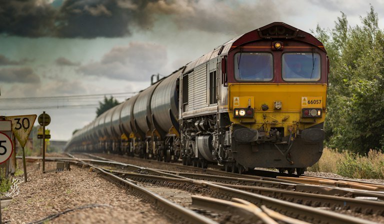 Illustrative railway line extending toward the horizon
